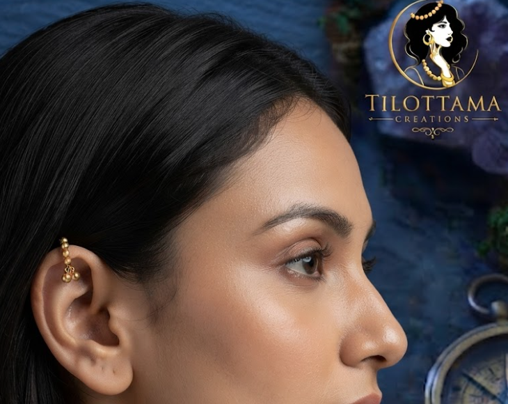 The Solstice Golden Drop Ear Cuff