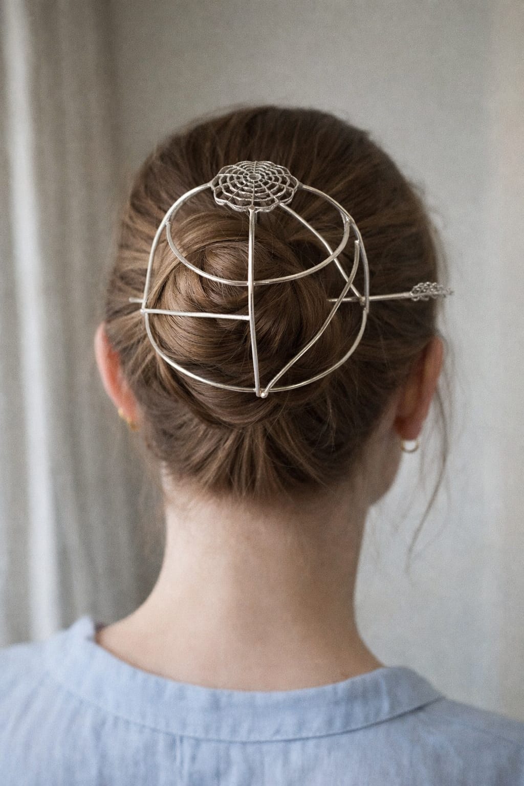 The Lunar Orbit Hair Cage