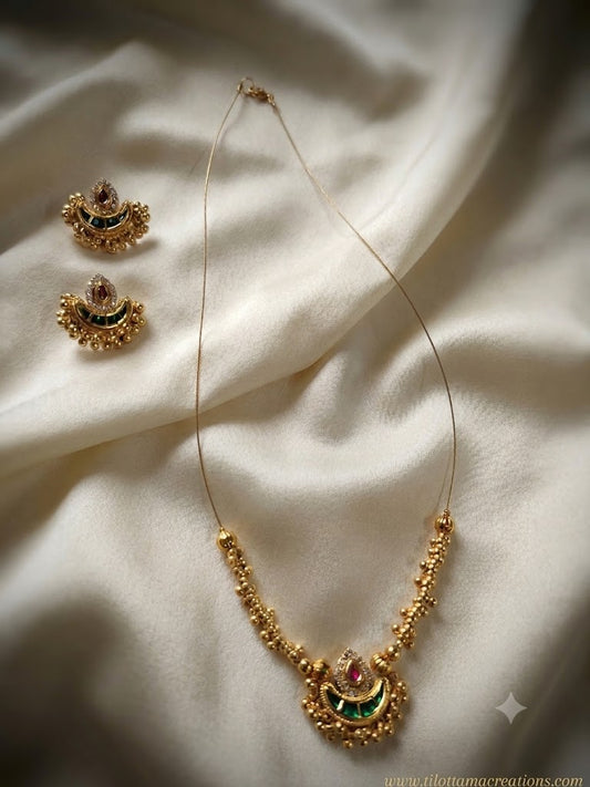 Golden Chandbali & Emerald Bead Necklace Set