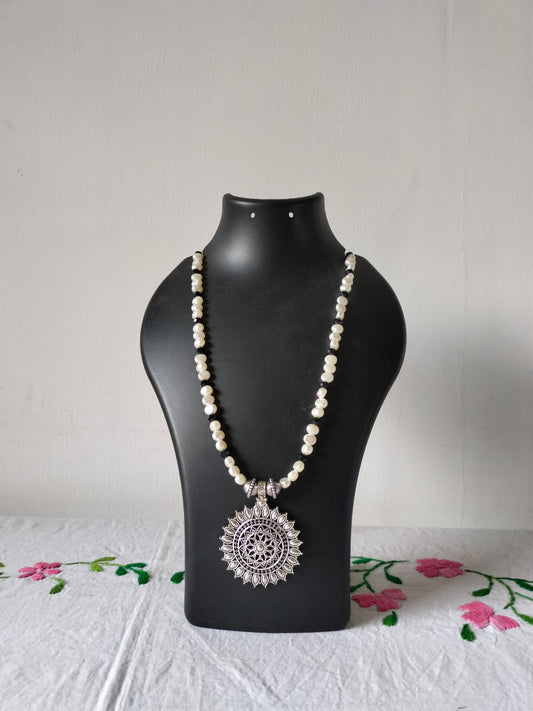 The Silver Mandala Pearl Statement