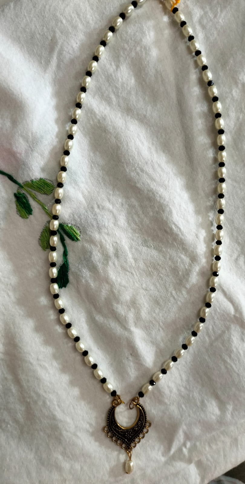 The Crescent Moon Pearl Charm