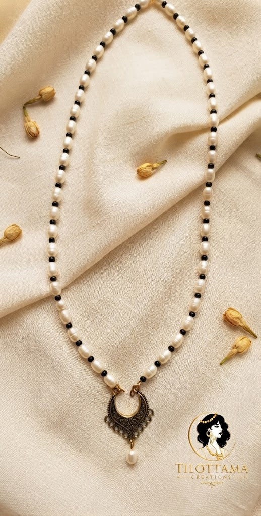 The Crescent Moon Pearl Charm