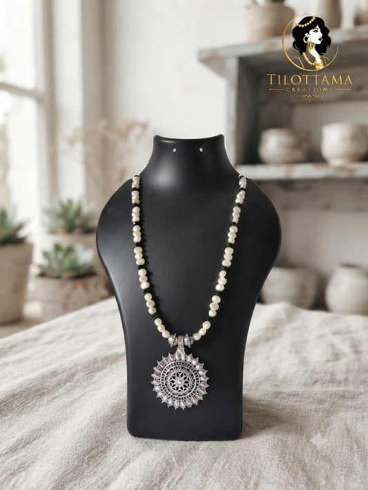 The Silver Mandala Pearl Statement