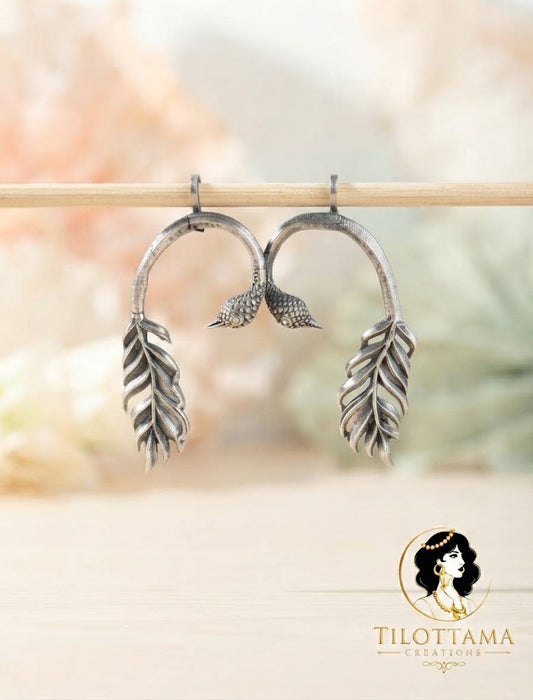 Oxidized Silver-Finish Swan Arch Statement Earrings with Leafy Feathers
